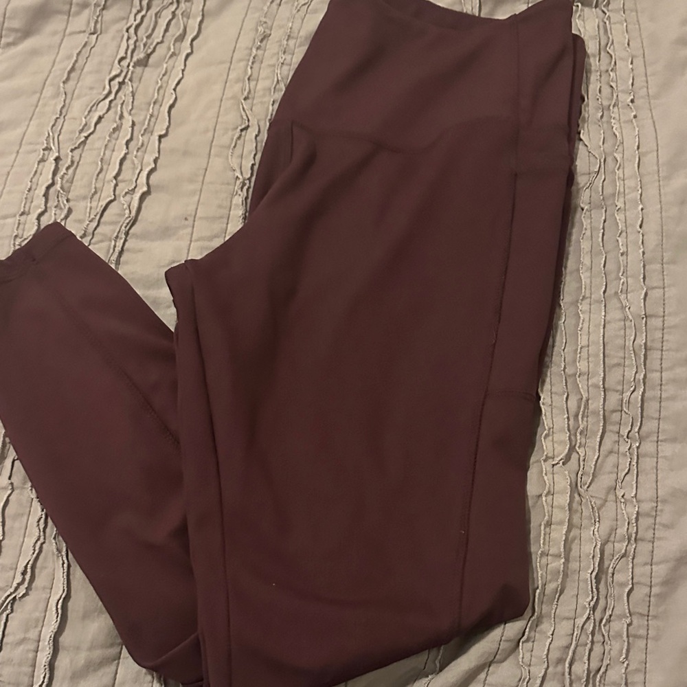 Danskin plum colored XL  Leggings W/side pockets